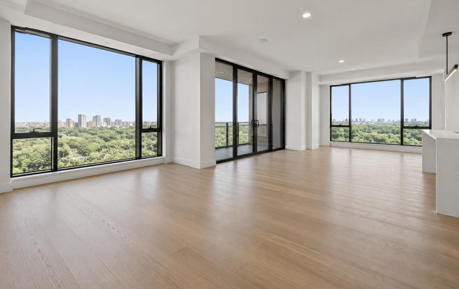 Downtown condo living room, vacant before virtual staging